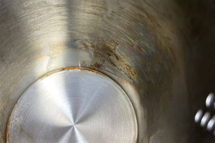 Does Lye damage stainless steel?